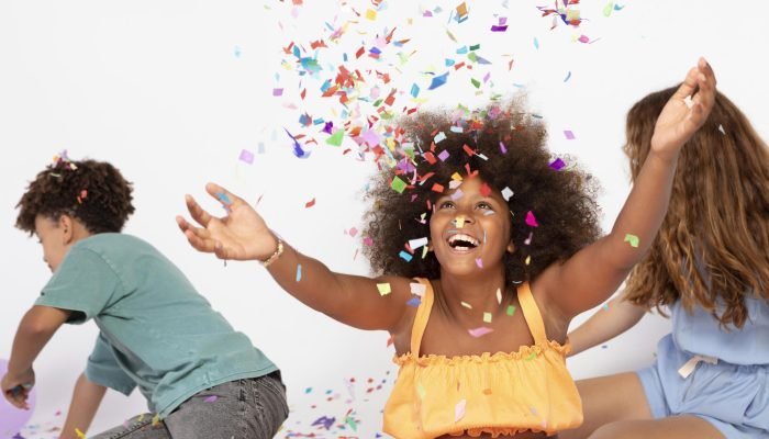 medium-shot-kids-playing-with-confetti.jpg